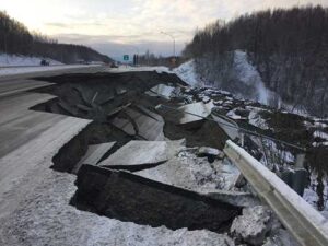 Photo courtesy of Alaska Department of Transportation and Public Facilities
A large hole and broken pavement block the Mirror Lake offramp on the Glenn Highway near Chugiak, Alaska, after the Nov. 30, 2018, earthquake.