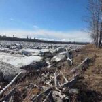 Photo by Dan Gillikin The Aniak River outside Dan Gillikin’s house is choked with chunks of ice during a slow breakup on May 10, 2026.