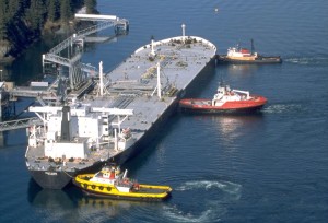 Tanker Polar Alaska being held dockside by Crowley tugs. Image-Crowley Maritime Corp.