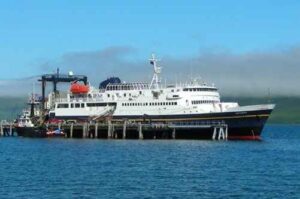 AMHS's M/V Tustumena docked in False Pass. Image-Shishaldin/ Creative Commons Attribution 3.0 Unported license.