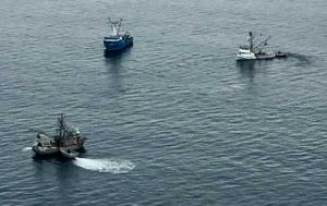 Alerted by an Urgent Marine Broadcast, the crews of two good Samaritan vessels, the Rocky B and the Remedy, assist the crew of the fishing vessel Kodiak Sockeye after the vessel began taking on water near Knowles Bay, Prince William Sound