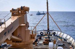 Coast Guard Cutter SPAR conducts an at-sea fisheries law enforcement boarding in the Bering Sea near Akutan Bay, Alaska, Sept. 20, 2016. Image-USCG