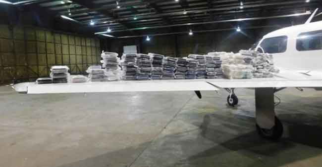 Two Arrested, Nearly 300 Pounds of Cocaine Seized from Canada-Bound Aircraft