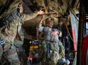 Army Spc. Eli Lewis, a mortarman assigned to the 2nd Platoon, Mortar Fire Control Center, 11th Airborne Division, prepares to jump from an Air Force C-130J Super Hercules aircraft assigned to the 36th Airlift Squadron during Exercise Red Flag-Alaska 26-2 over Joint Base Elmendorf-Richardson, Alaska, June 1, 2026.
