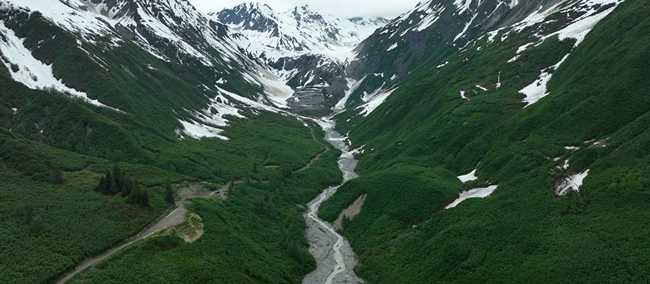 The site of the Palmer mine project, proposed in Alaska’s Chilkat Valley, is along Glacier Creek, which flows into the Chilkat River. The Chilkat Valley is the most biodiverse of any valley in Alaska. It is home to all five species of wild salmon, the largest gathering of bald eagles in North America, and both the community of Klukwan (Lingít: Tlákw Aan, or “eternal village”) and Haines (Lingít: Deishu). Courtesy of Chilkat Forever