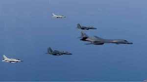 A U.S. Air Force B-1B Lancer leads a formation of Republic of Korea Air Force F-15K Slam Eagles and F-16 Fighting Falcons during a bilateral mission into South Korean airspace March 21, 2017. Image-DoD