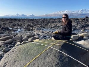 Molly Odell maps pit-style petroglyphs near Cape Hepburn, Kodiak Island. Image-Alutiiq Museum