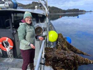 Photo by Amanda Kelley
Josianne Haag recovers a mooring in a kelp farm in Jakolof Bay, Alaska.