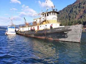 Oil and hazmat removal operations began earlier this year on the tug Lumberman. Image-NOAA