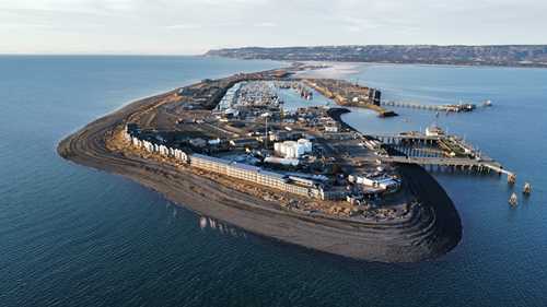 Seismologists tapped into the fiber optic cable network to study offshore faults This aerial photo shows the Homer Spit, which is just south of the Cook Inlet. Although they are not visible in the photo, fiber optic cables beneath the water on the top left of the image provided data for these experiments.Qibin Shi