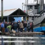 Participants in the Introduction to Mariculture in Southeast workshop at Salty Lady Seafoods’ oyster floating upweller system (FLUPSY) in Auke Bay. Photo by Heather Hintze/Central Council of Tlingit & Haida Indian Tribes of Alaska.