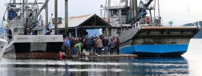 Participants in the Introduction to Mariculture in Southeast workshop at Salty Lady Seafoods’ oyster floating upweller system (FLUPSY) in Auke Bay. Photo by Heather Hintze/Central Council of Tlingit & Haida Indian Tribes of Alaska.
