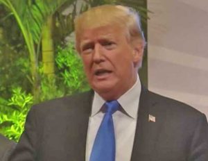 Trump speaking to reporters during Asia trip. Image-VOA