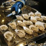 A plate of oysters at the 2026 Mariculture Conference of Alaska. Photo by Jessica Whitney/Alaska Sea Grant.