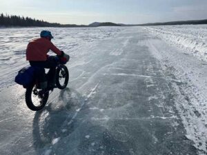Photo by Forest Wagner
Ned Rozell rides a plowed winter road on the Yukon River that allows cars and trucks to drive between Manley Hot Springs and the village of Tanana in the winter.