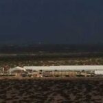 This photo shows a view of US Immigration and Customs Enforcement’s (ICE) Camp East Montana detention center at Ft. Bliss in El Paso, Texas. (Photo by Corrie Boudreaux/El Paso Matter)