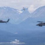 Two U.S. Air Force rescue helicopters, a HH-60G Pave Hawk, left, and a HH-60W Jolly Green II, both assigned to the 210th Rescue Squadron, 176th Wing, Alaska Air National Guard. (Alaska National Guard photo by Alejandro Peña)