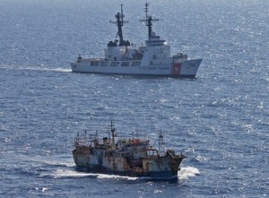 Coast Guard Cutter Rush escorting suspected high seas drift net fishing vessel Da Cheng in the North Pacific Ocean in 2012.