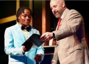 Pierre Damas Bel received his diploma at a graduation ceremony in an undated family photo. (Photo: Instagram/family photo)

