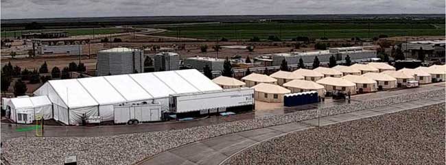 This undated photo provided by HHS’ Administration for Children and Families shows the shelter used to house unaccompanied foreign children in Tornillo, Texas.