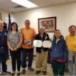 From the left, Verdie Bowen, Director, Alaska Military and Veterans Affairs, Amy Arsenault, Program Technician, Employer Support of the Guard and Reserve, Tony Nannaga, PVT Tommy Heckman, Martina Heckman and Irene Heckman recognize PVT Heckman’s Alaska Territorial Guard service during a July 20 ceremony. (Photo by Magen James, Alaska Forget Me Not Coalition.)