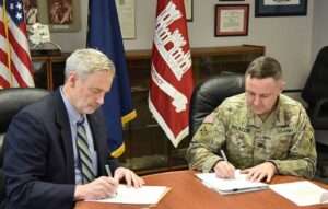 Agreement signing between Unalaska and Army Corps of Engineers for channel project.