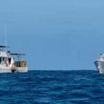 U.S. Coast Guard Cutter Douglas Denman (WPC-1149 and U.S. Coast Guard Cutter Forrest Rednour (WPC-1129) transit in formation. (U.S. Coast Guard photo by Petty Officer 3rd Class Chris Sappey)
