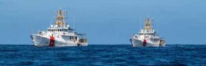 U.S. Coast Guard Cutter Douglas Denman (WPC-1149 and U.S. Coast Guard Cutter Forrest Rednour (WPC-1129) transit in formation. (U.S. Coast Guard photo by Petty Officer 3rd Class Chris Sappey)