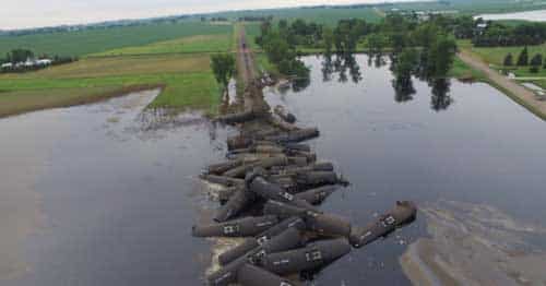 ‘We Don’t Know… How Bad It Is’: 31-Car Oil Train Derails Into Iowa Floodwaters