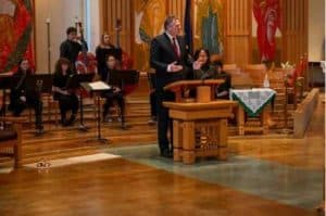 Governor Dunleavy speaking at St. Paul’s Catholic Church. Image-State of Alaska