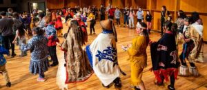 UAF photo by Leif Van Cise
The Dakwakada Dancers of Haines Junction invite members of the audience on stage at the 50th Festival of Native Arts on Feb. 24, 2024.