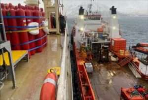 Response personnel successfully offloaded CO2 bottles from M/V Genius Star XI for inspection, refill, and reinstallation while anchored in Broad Bay. The bottles are part of the ship’s installed firefighting equipment that are required to meet Safety Of Life At Sea requirements established by the International Maritime Organization. Courtesy photo.
