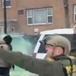 US Border Patrol Commander Gregory Bovino throws a tear gas grenade at protesters on January 21, 2026 in Minneapolis, Minnesota. (Image: Screengrab/social media video)