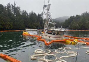 The 52-foot fishing vessel, Haida Lady, partially above the waterline near Sitka. U.S. Coast Guard photo by MSD Sitka personnel