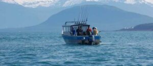 Anglers fish on a charter vessel in Alaska. Credit: Richard Yamada