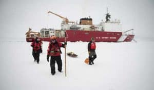 ARCTIC OCEAN – U.S. Coast Guard Petty Officer 3rd Class Shannon Eubanks (left), Petty Officer 1st Class David Edelson (middle) and scientist Jeremy Wilkinson walk on the ice to conduct an ice survey Tuesday, Oct. 2, 2018, about 715 miles north of Barrow.(NyxoLyno Cangemi/U.S. Coast Guard)