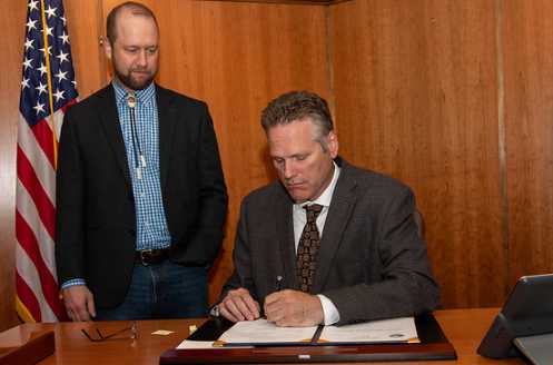 Governor Dunleavy Signs House Bill 14, Closes ‘Schneider Loophole’
