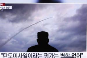 Launch is televised on news programming in North and South Korea.