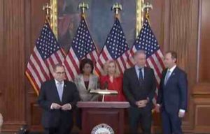 Democrats gather to announce articles of impeachment of Trump. Image-CNBC video screengrab