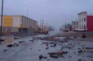 Debris lies on a street in Nome, Alaska, after it was inundated by storm flooding. New research suggests that high wind events in Nome could triple by 2099. Photo by Dave Atkinson