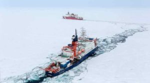 An international team of scientists aboard the U.S. Coast Guard Cutter Healy and the German research icebreaker Polarstern met at the North Pole in 2015 to survey elements in the Arctic Ocean. (Photo by Stefan Hendricks, Alfred Wegener Institute)