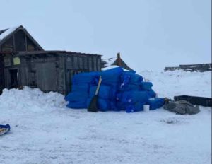 The checkpoint was moved to old Shaktoolik and residents repurposed an old building to provide heat, generator, lights, coffee pots, and microwave. Image-The Iditarod