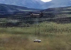 Alaska Army National Guard Soldiers assigned to 1st Battalion, 207th Aviation Regiment execute an extraction mission via a CH-47 Chinook helicopter over Healy, Alaska, June 18, 2020.  (Alaska National Guard courtesy photo)