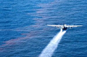 A U.S. Air Force Reserve plane sprays Corexit over the Deepwater Horizon oil spill in the Gulf of Mexico.