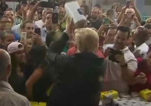 Trump throwing paper towel to Puerto Ricans in aftermath of deadly hurricane. Image-Guardian News video screenshot