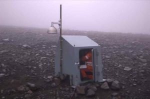 Guy Tytgat in a seismic station hut near Pavlof volcano in 2007. Alaska Volcano Observatory photo by Cyrus Read.