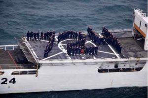 U.S. Coast Guard Cutter Douglas Munro crewmembers stand in formation on the back of the cutter, July 24, 2020. The cutter's hull day, July 24th, correlates with its hull number, 724. U.S. Coast Guard courtesy photo.