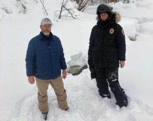 Iditarod Volunteer Doug Ramsey and Wildlife Trooper Knier at incident site. 