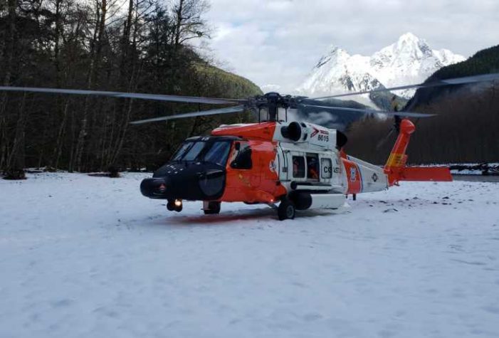 Coast Guard Aircrew Assists Three Stranded Mariners, Two Dogs on the Gilkey River, Sunday
