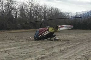 Helicopter wreckage in a field near Palmer, Alaska. 